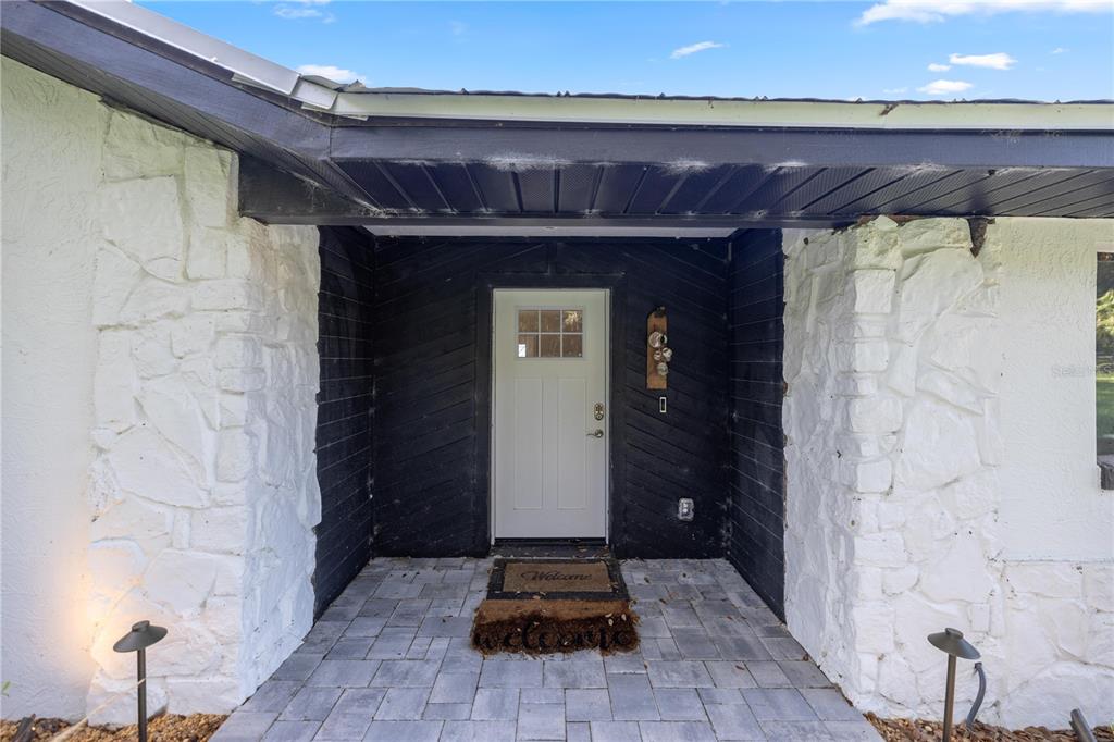 a front view of a house with a shower