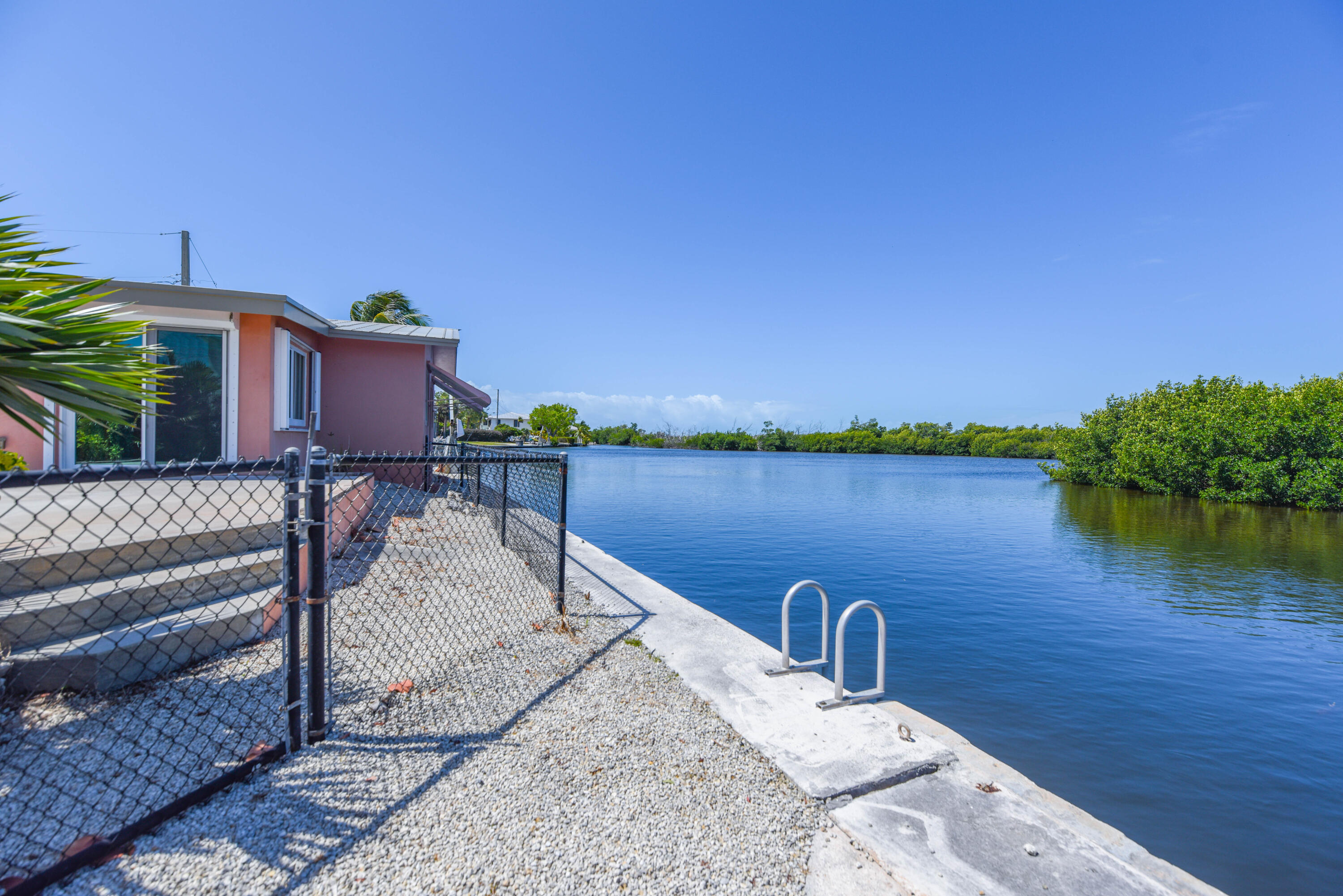 a house view with a lake view