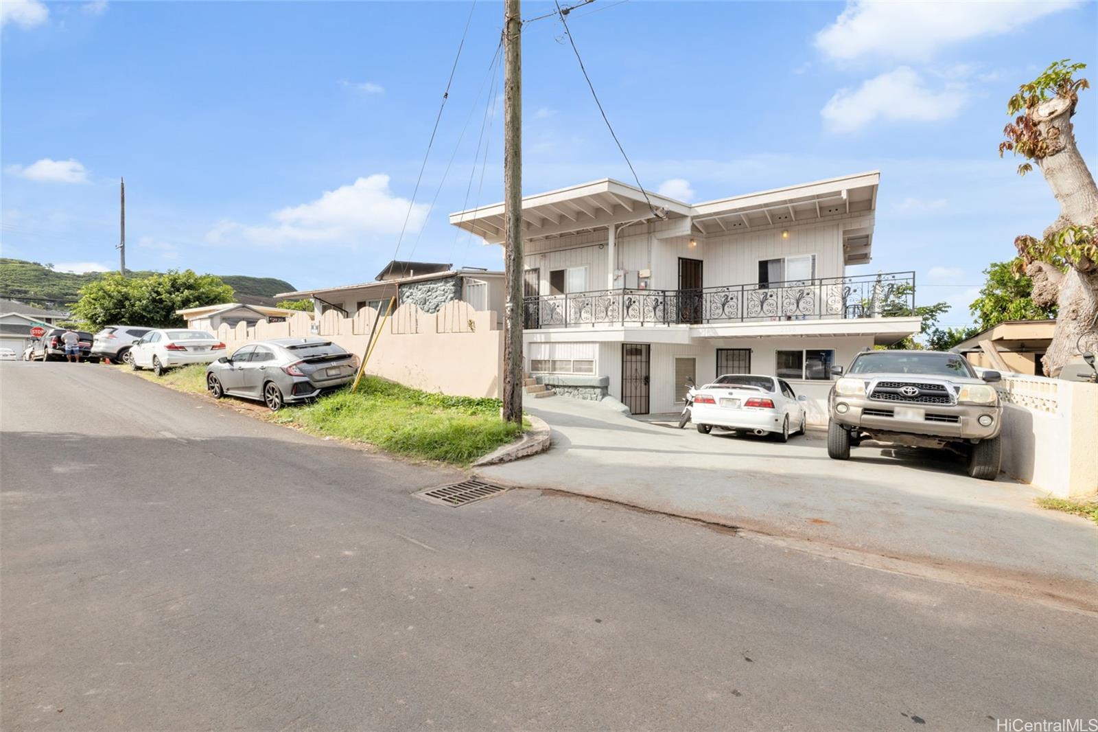 a view of a car parked in front of a house