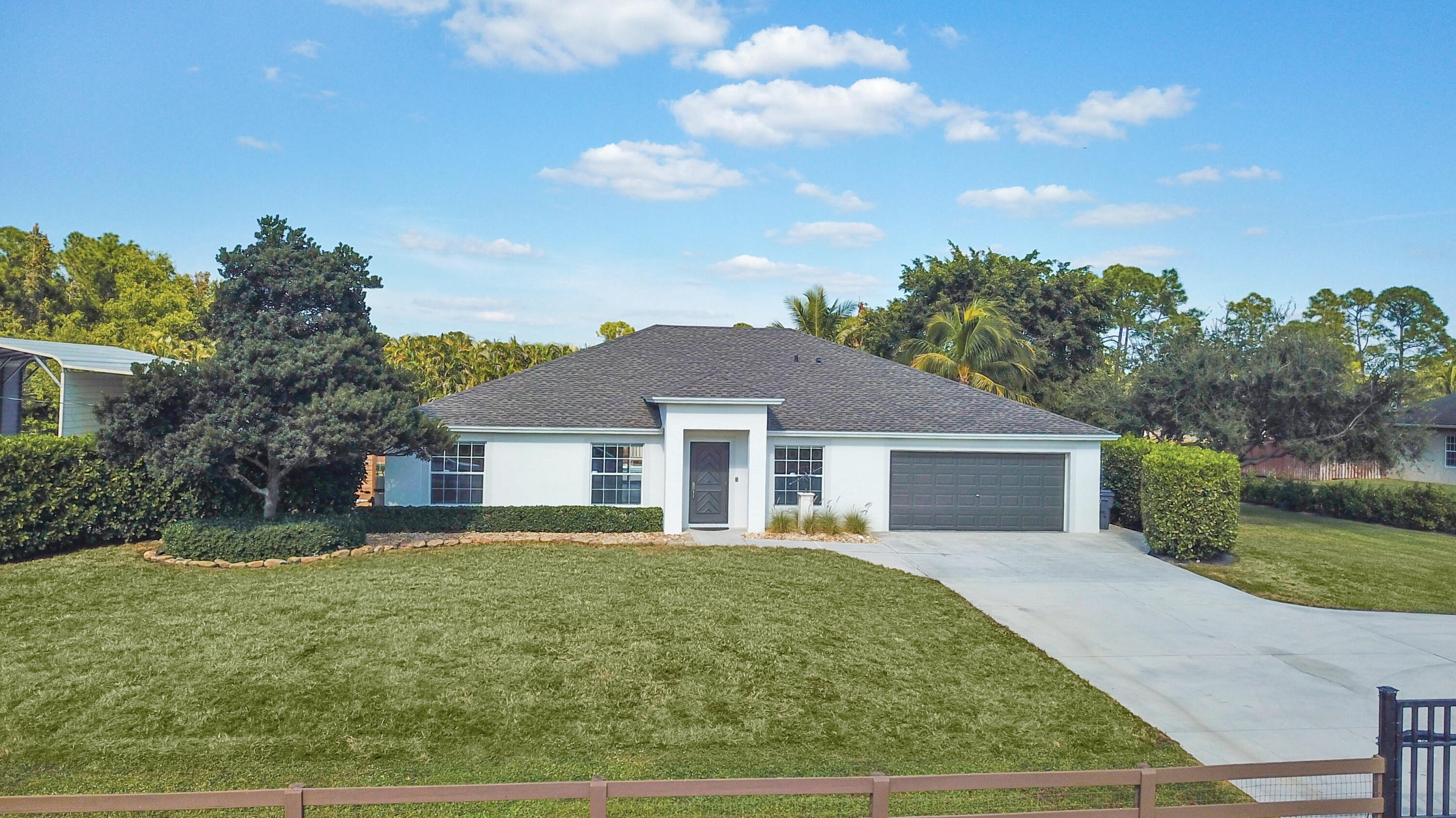 front view of a house and a yard