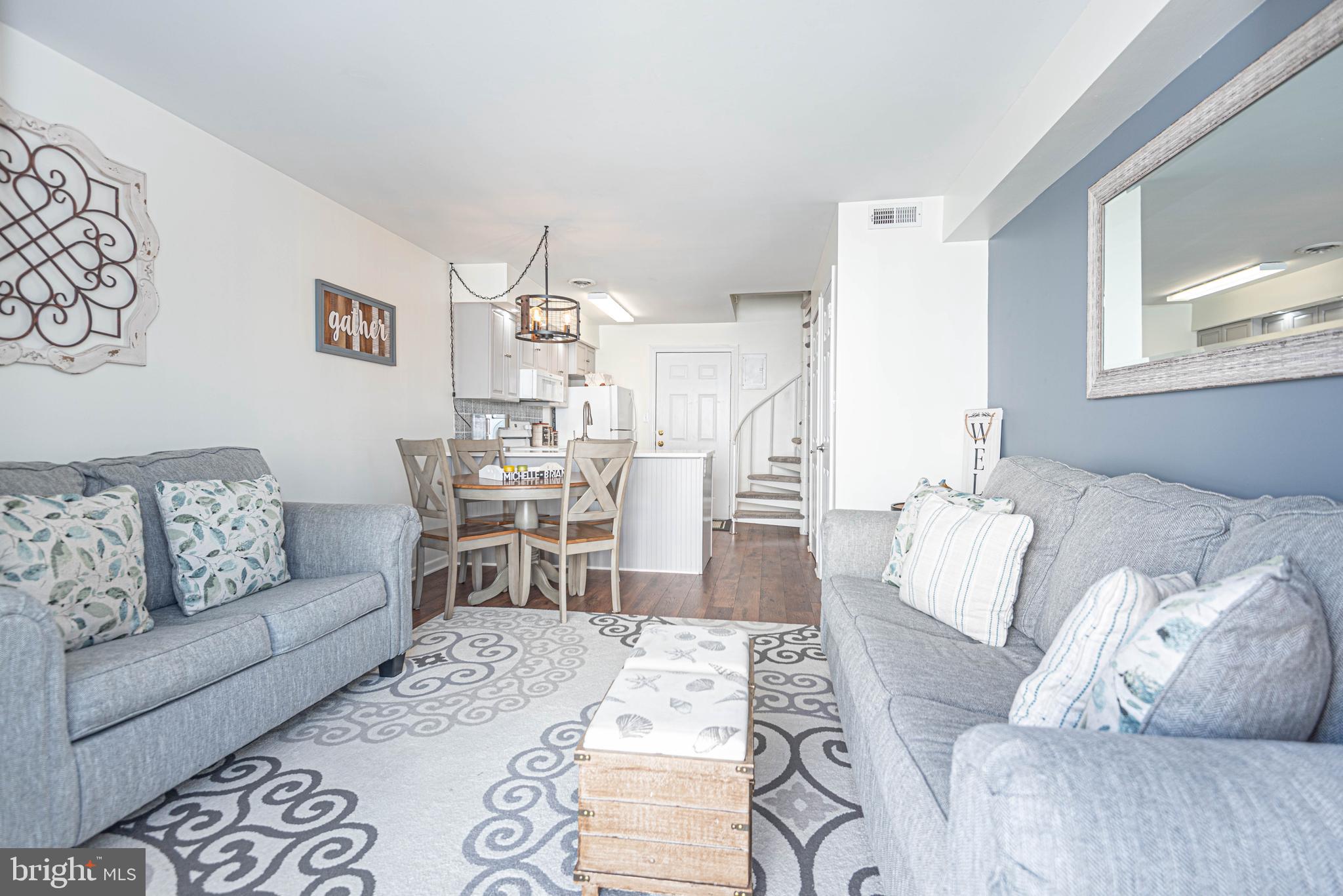 a living room with furniture and a couch