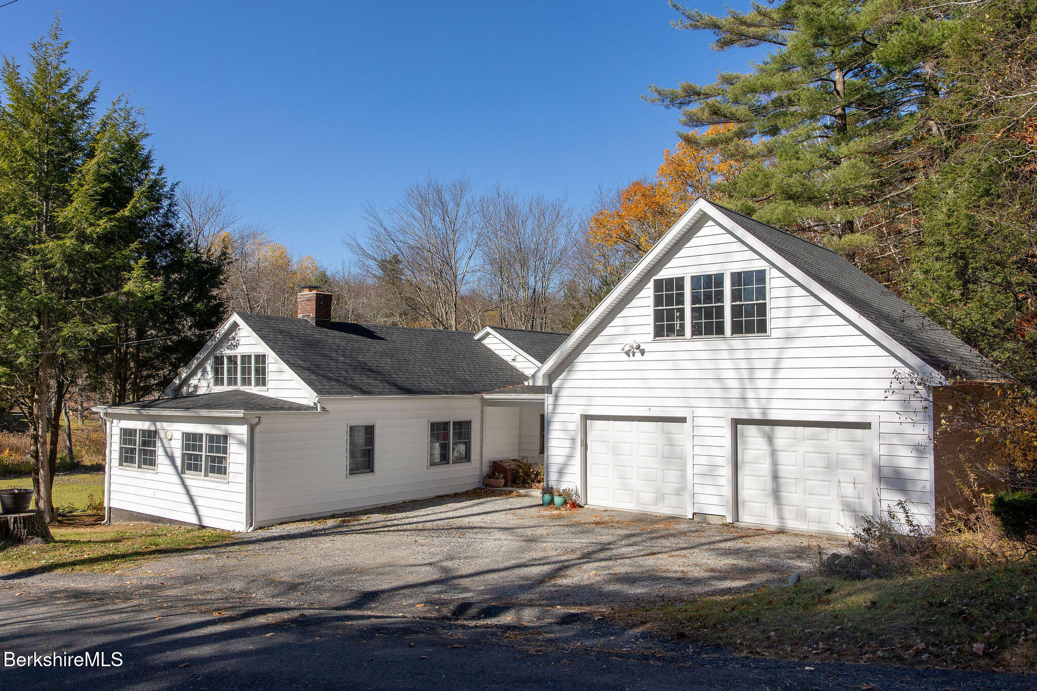 a front view of a house with a garage