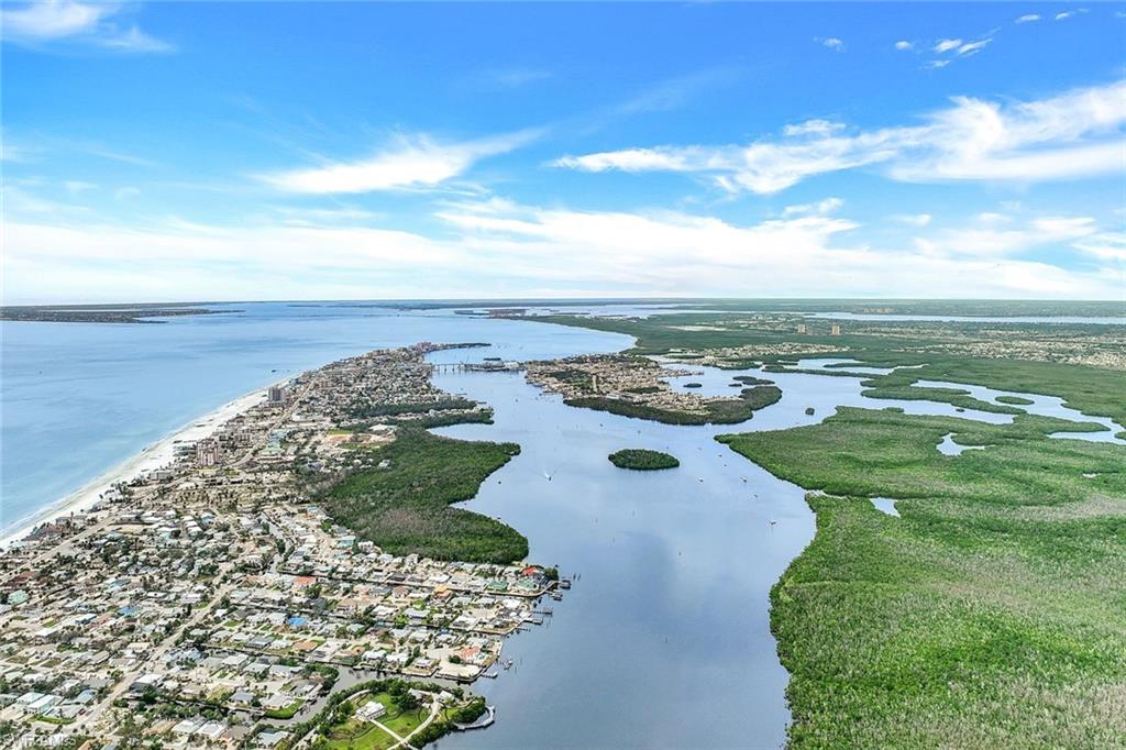 a view of a lake with a yard