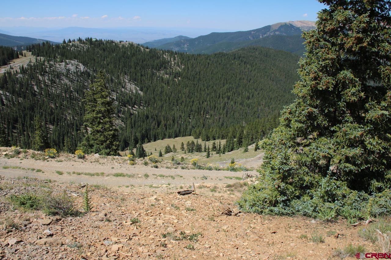 a view of a beach with a mountain