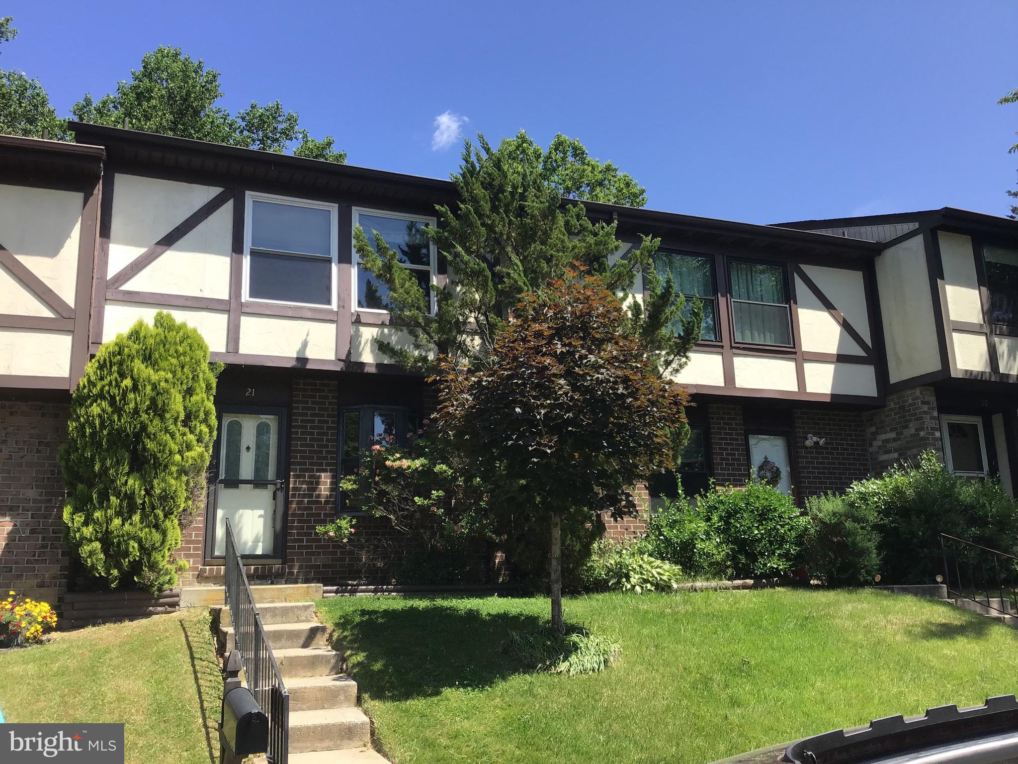 a front view of house with yard