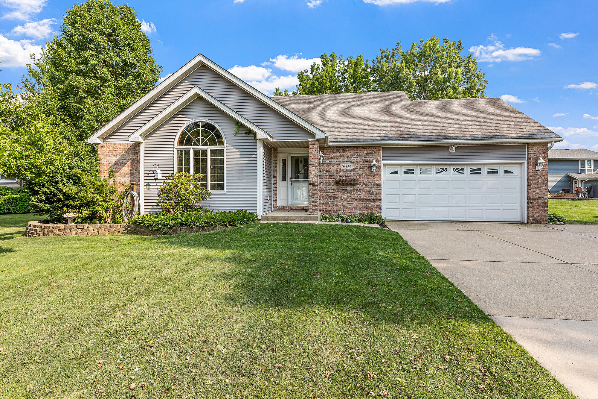 a front view of house with yard