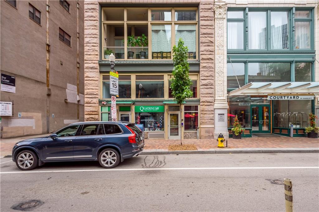 a car parked in front of a building