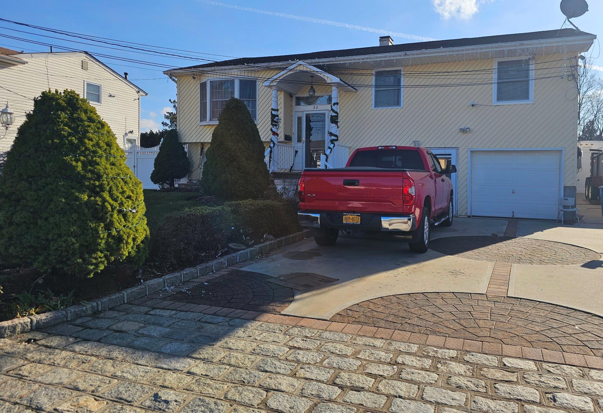 View of front of property with a garage