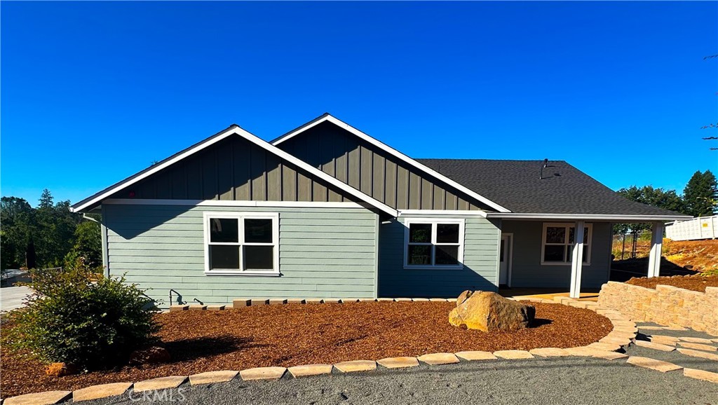 a front view of a house with a porch