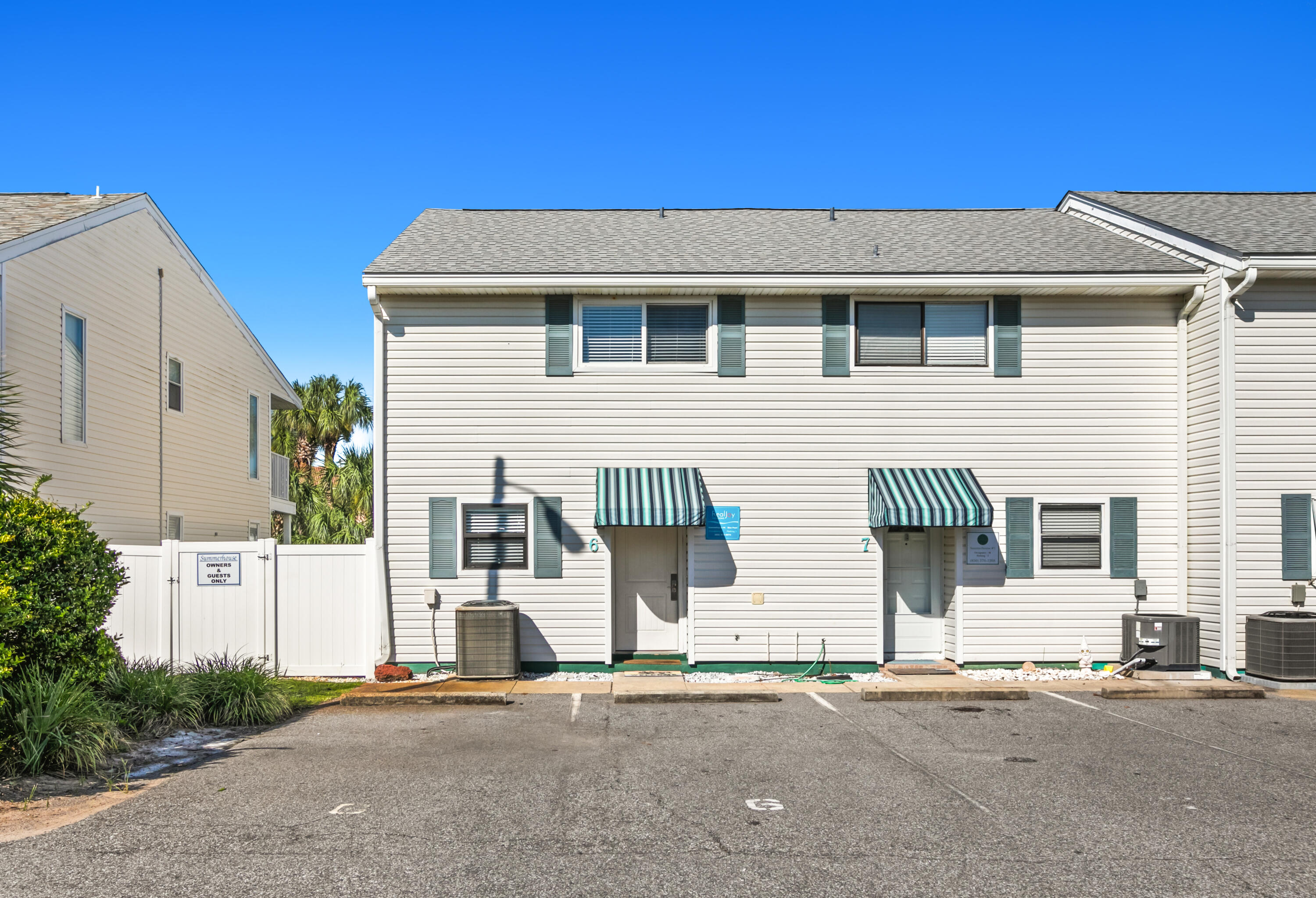 a view of a house with a street