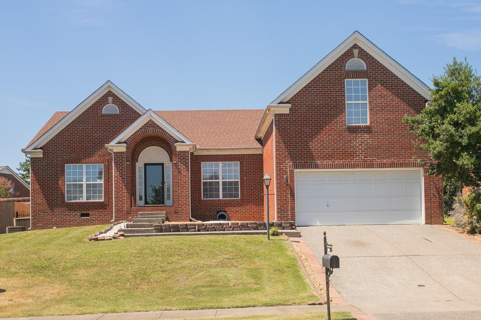 a front view of house with yard