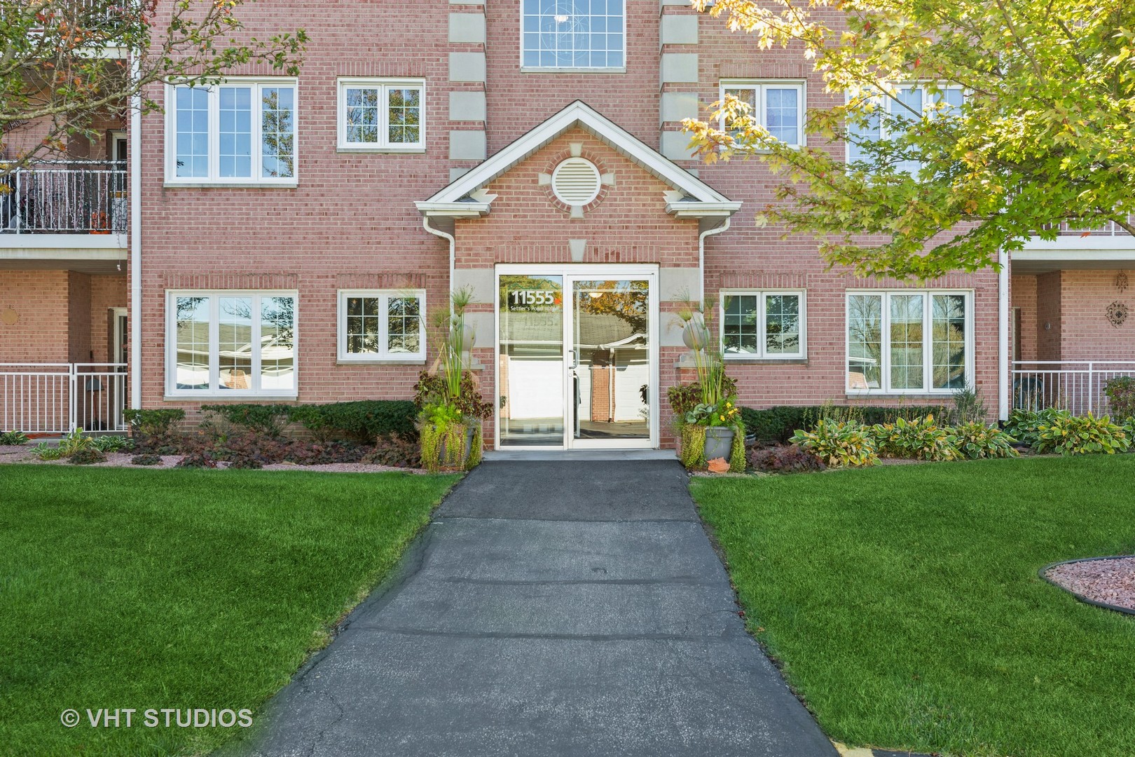 front view of a house with a yard