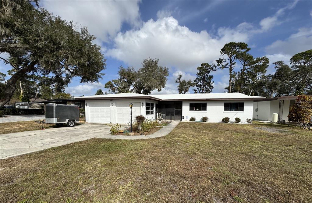 front view of a house with a patio