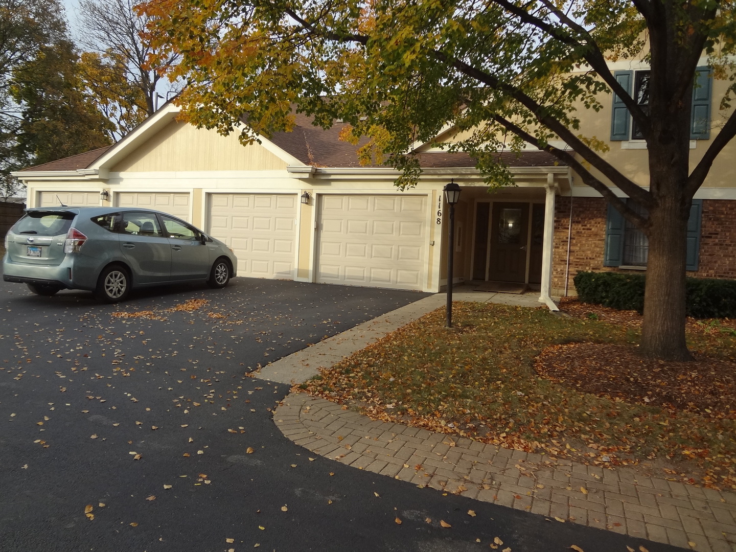 a view of a car in front of house