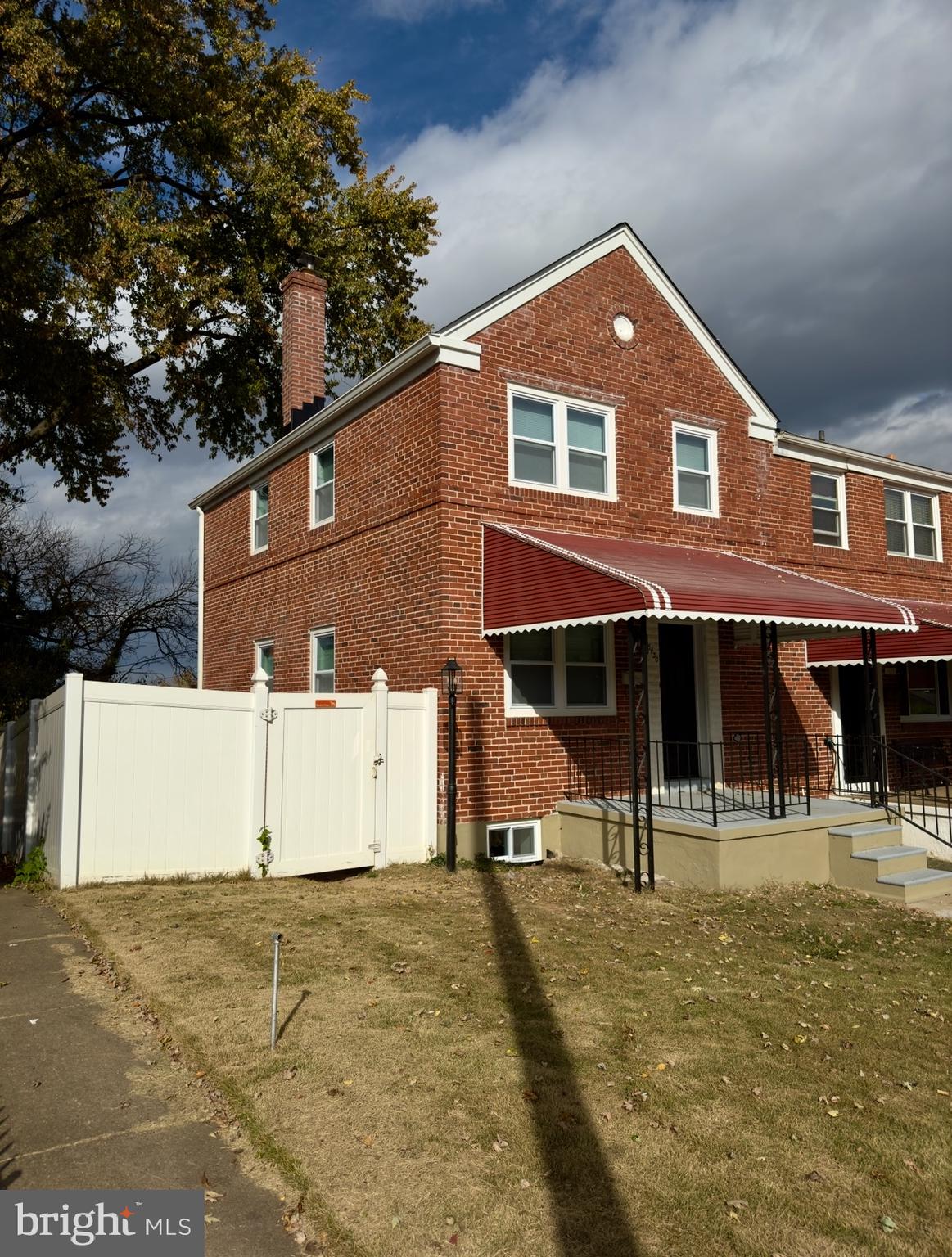 a front view of a house with a garage