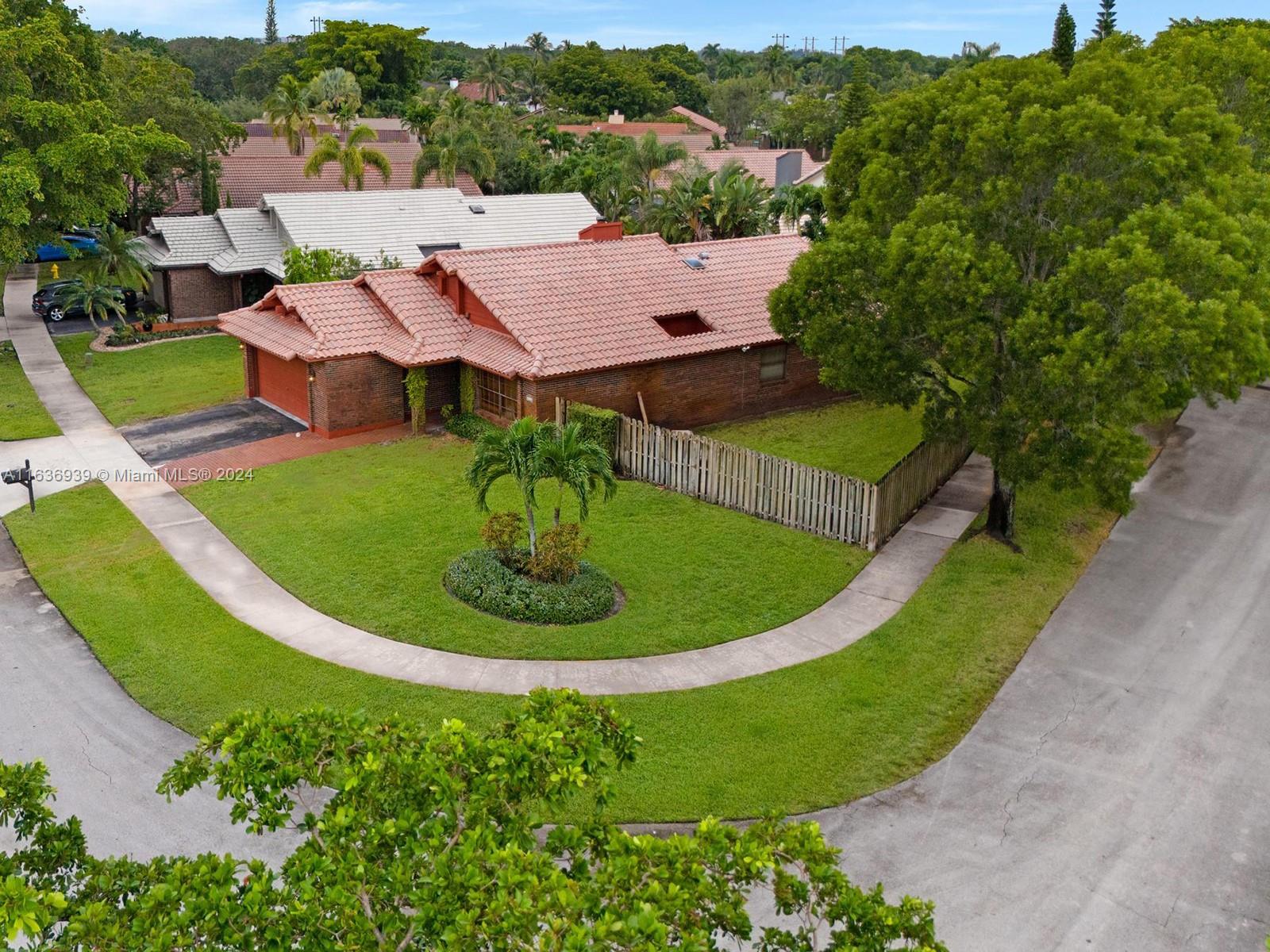 a view of a house with a swimming pool