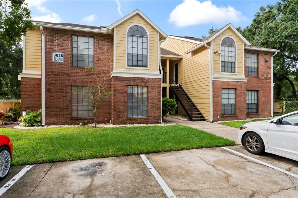 a car parked in front of a house