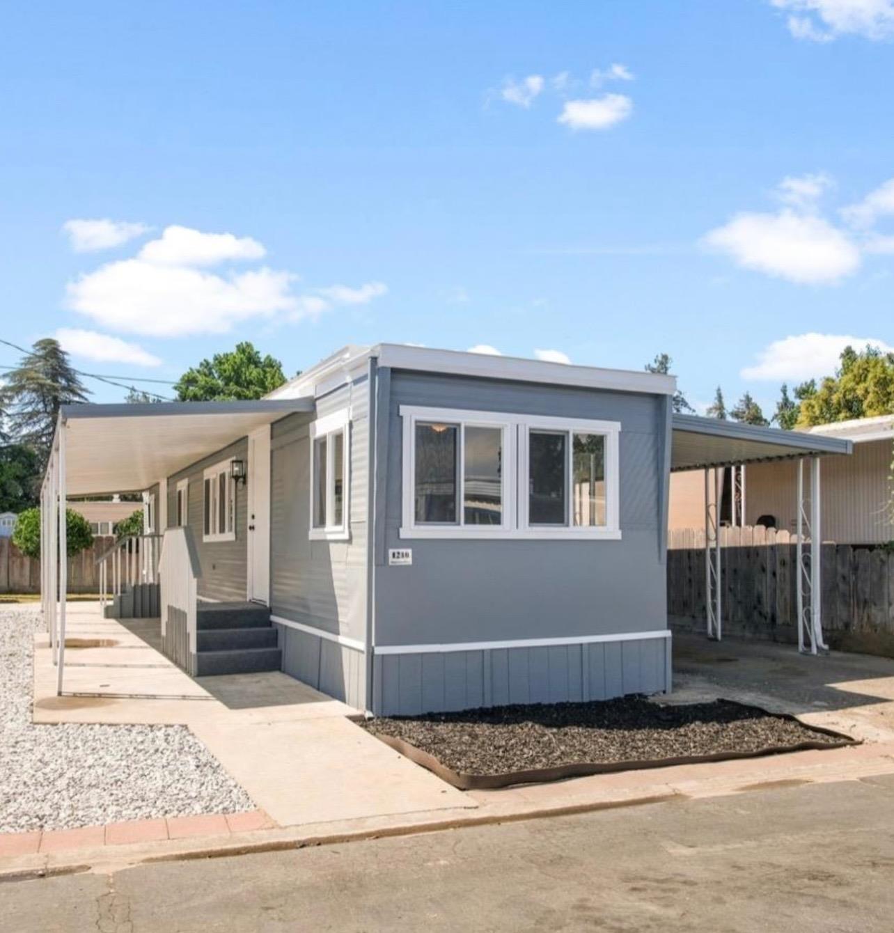 a house view with a backyard space