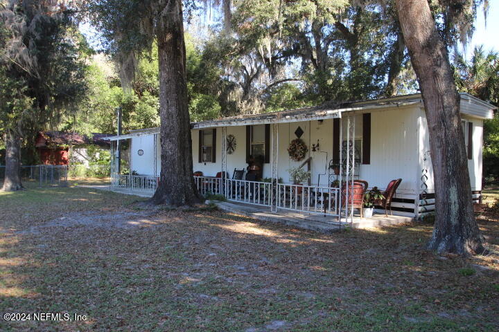 a view of outdoor space and yard