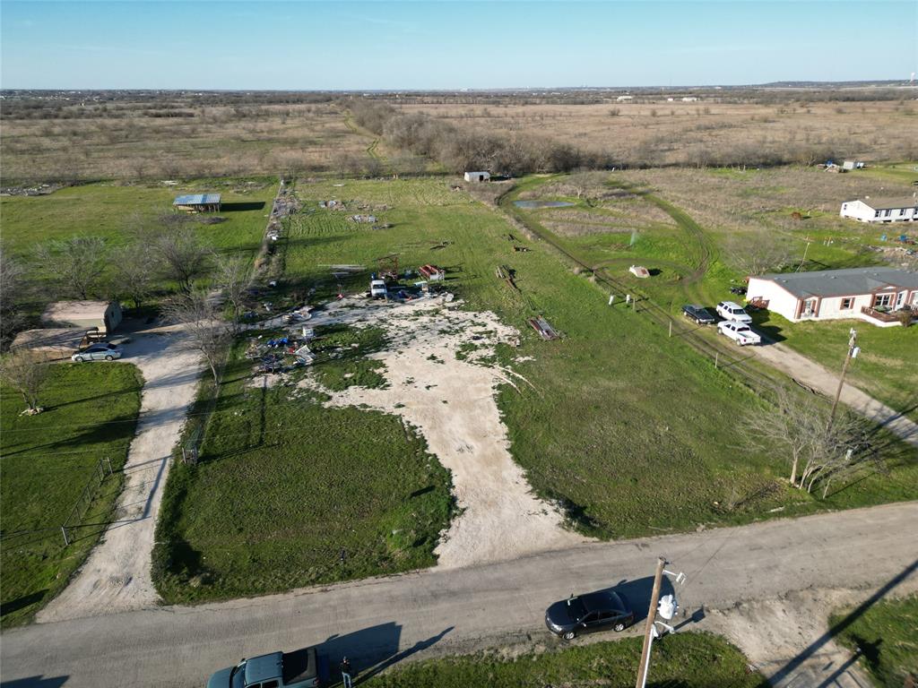 a view of a lake with a yard