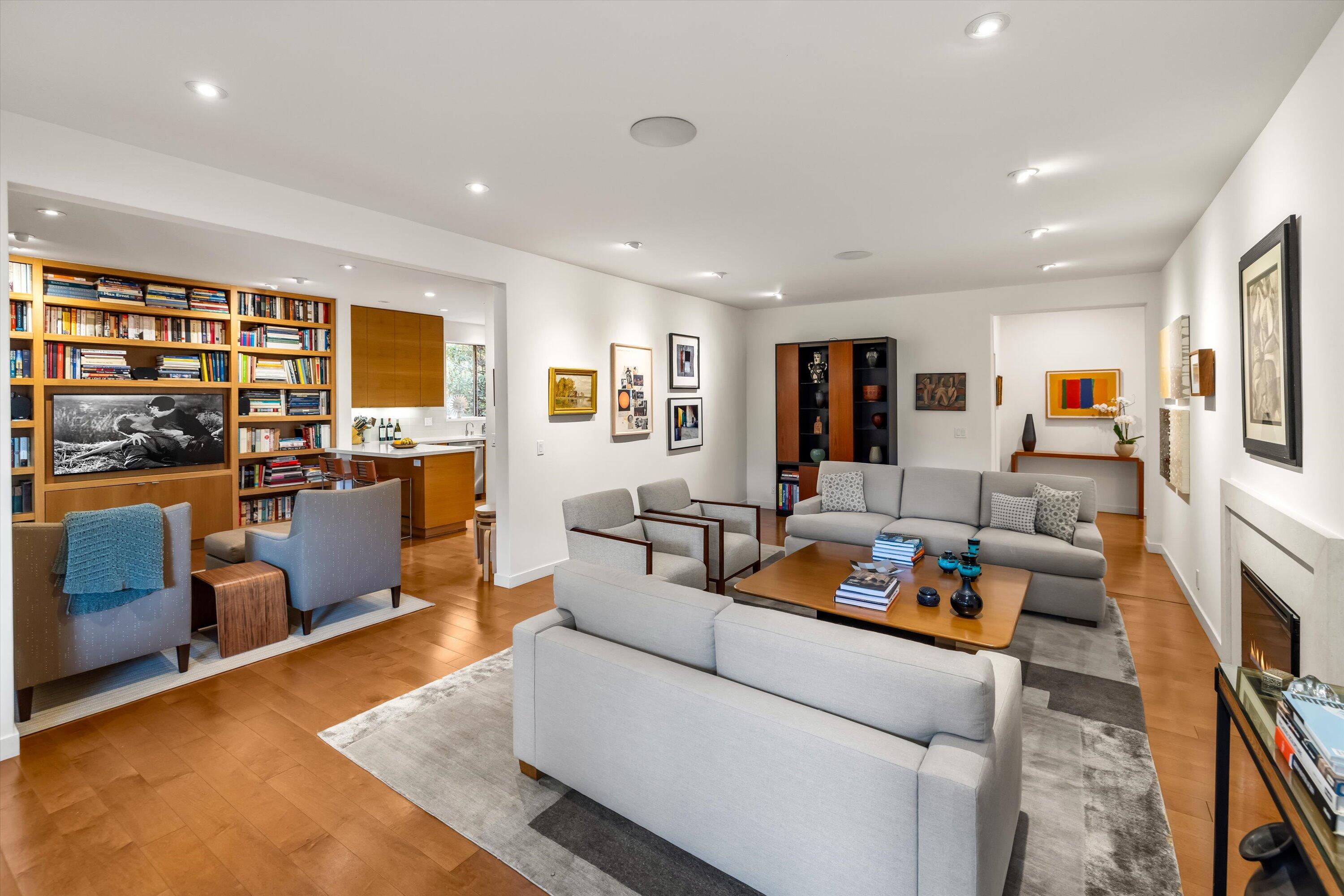 a living room with furniture and a table