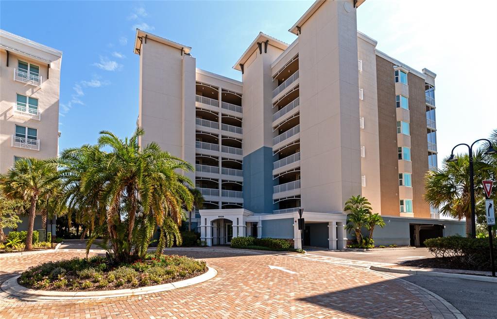 a view of a building with a yard