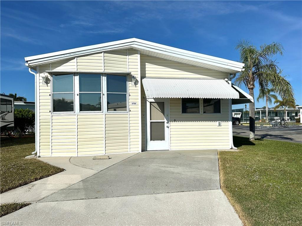 a front view of a house with a garage