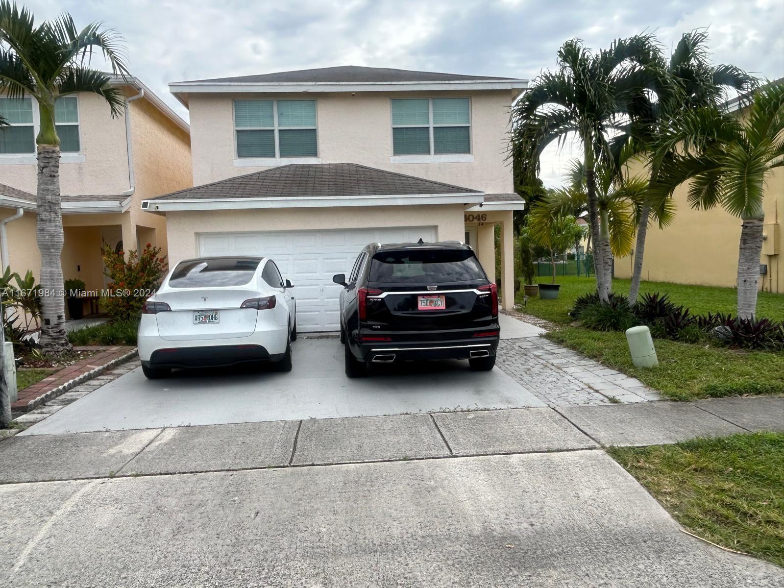 a car parked in front of a house