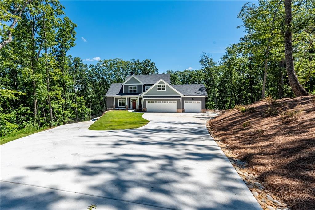 a view of a house with a big yard