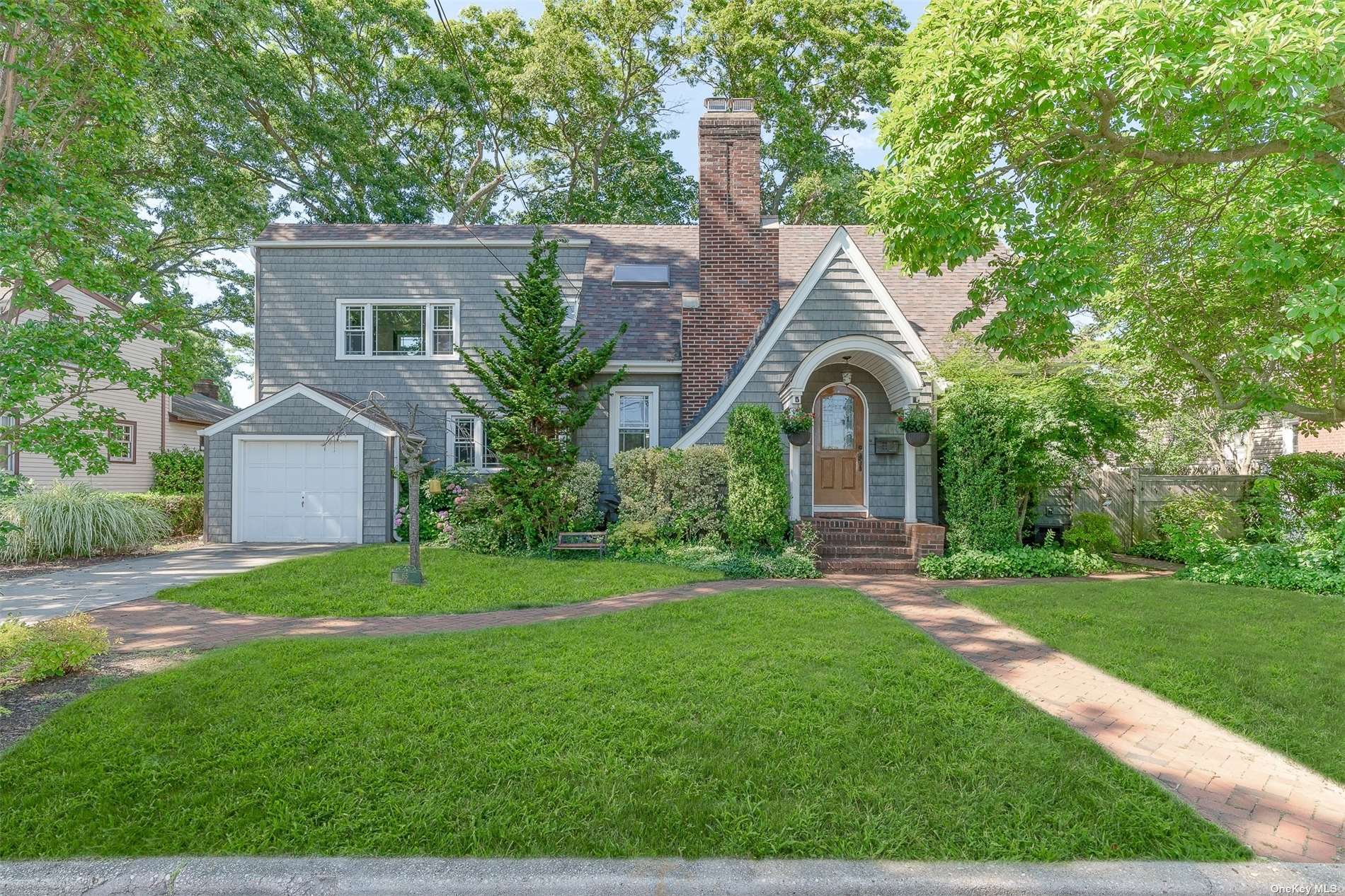 a house view with a garden space