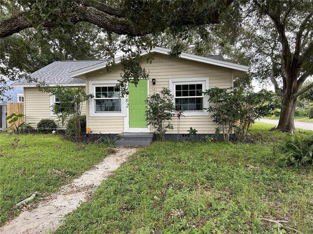 a front view of house with yard