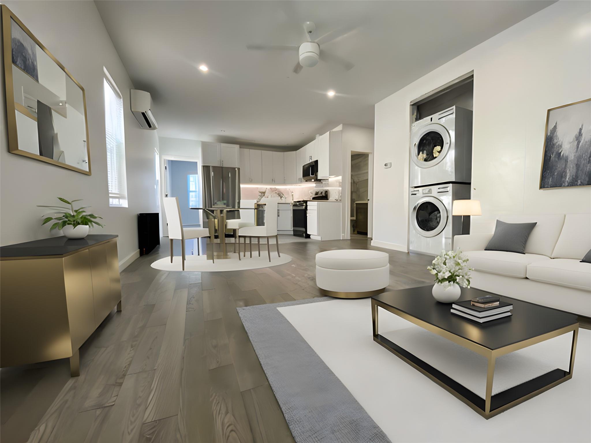 a living room with furniture a rug and white walls