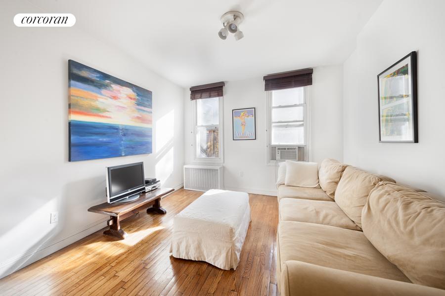 a living room with a couch and a table