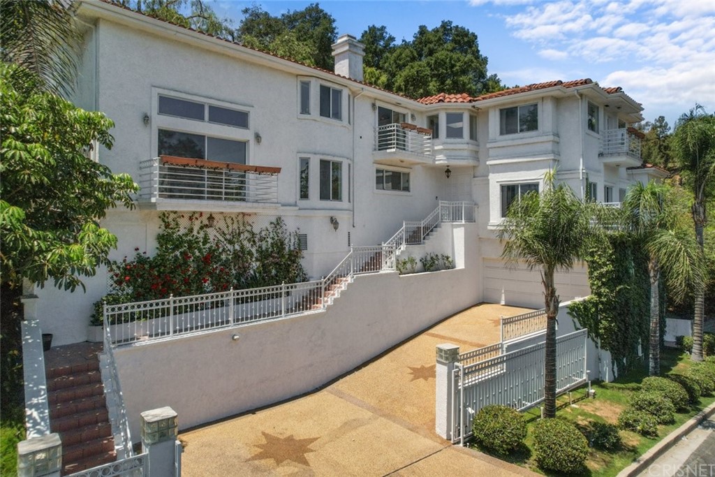 a view of house with outdoor space