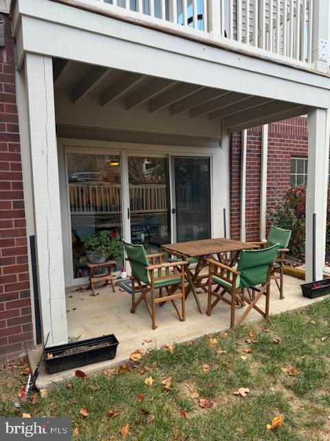 a view of a house with patio outdoor seating area