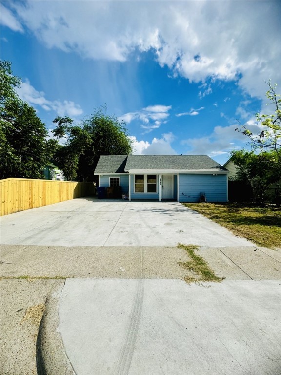 a view of house with yard