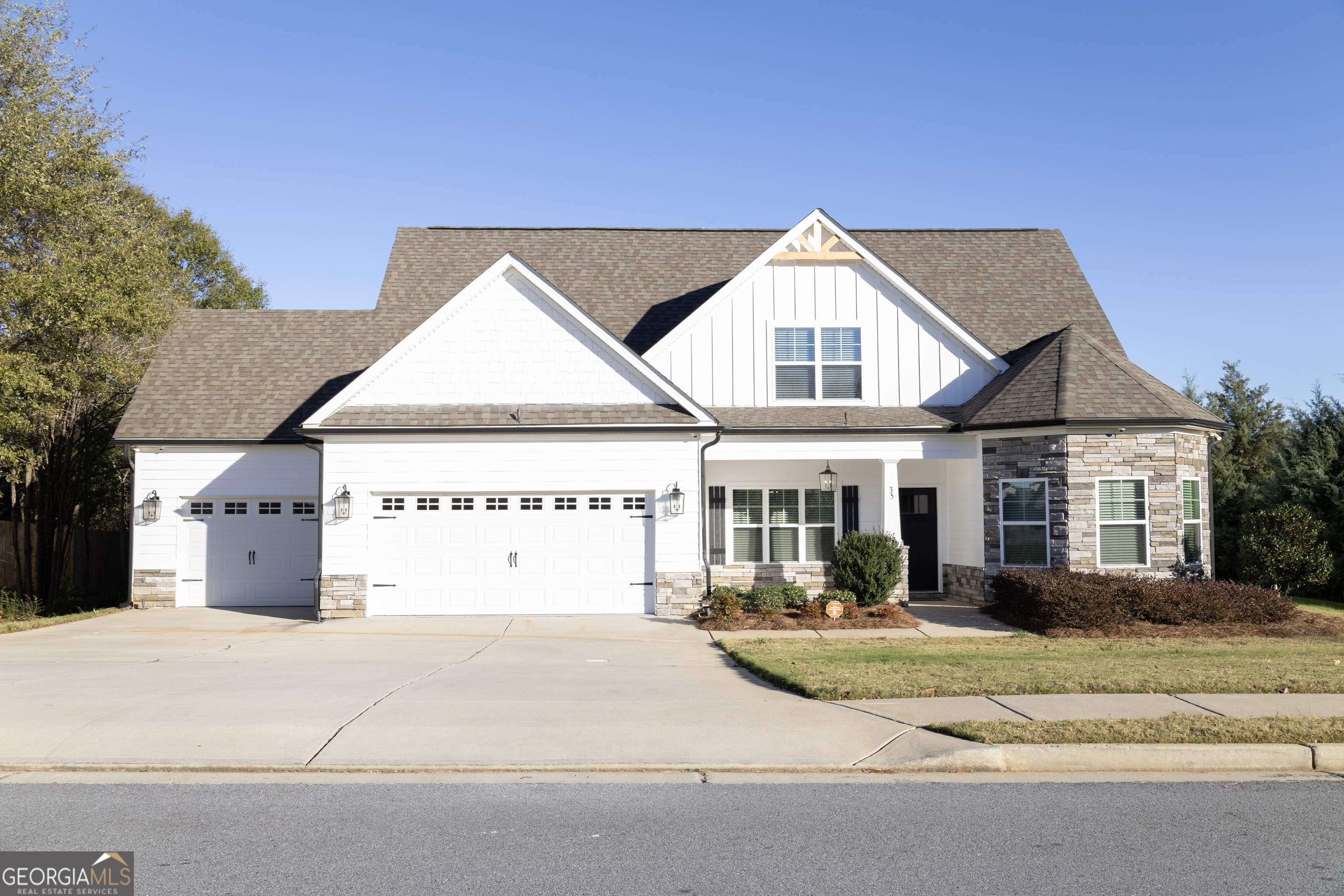 a view of multiple houses with a yard