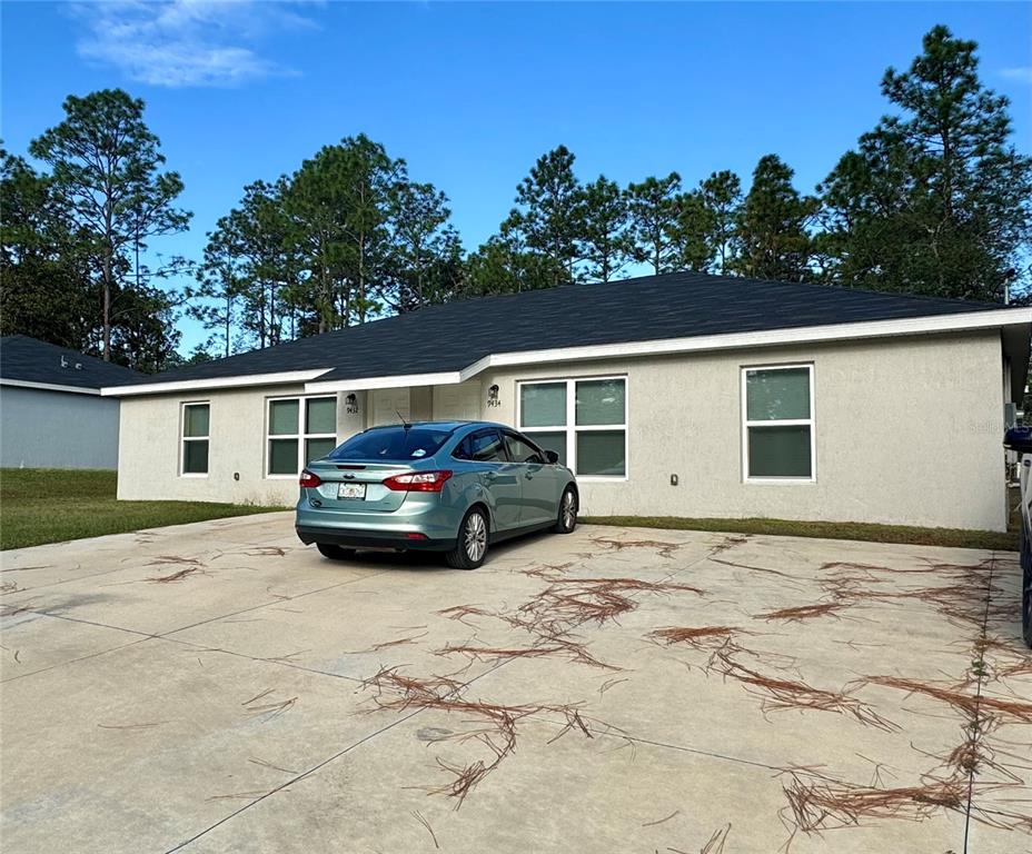 a car parked in front of a house