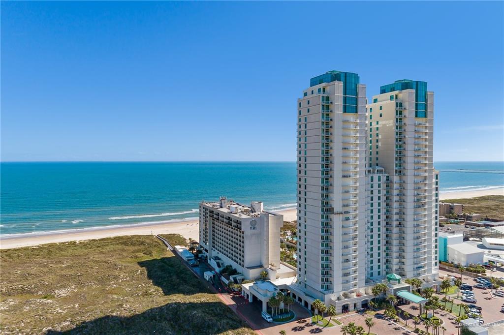 a view of a building with an ocean