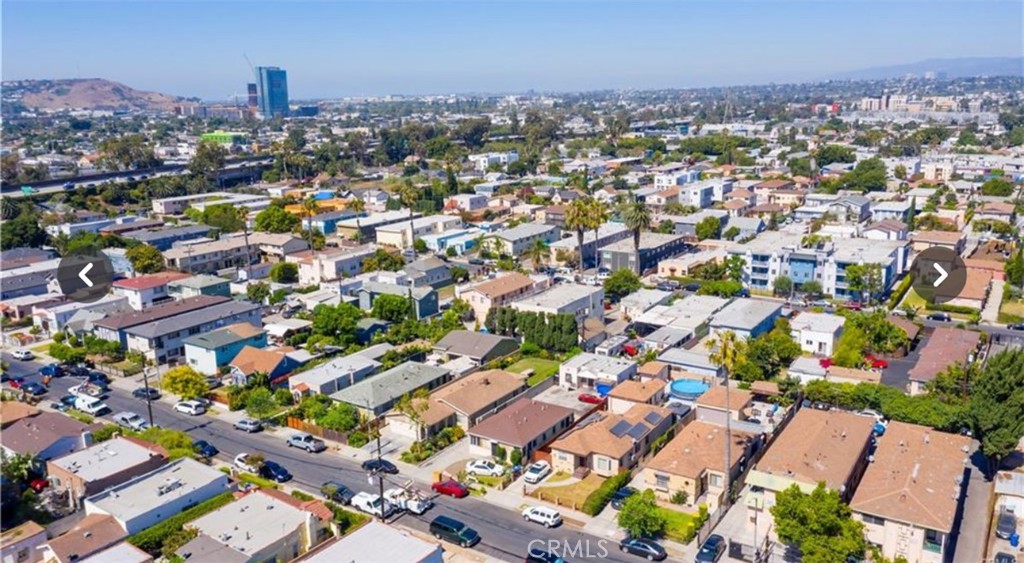 an aerial view of a city with lots of residential buildings