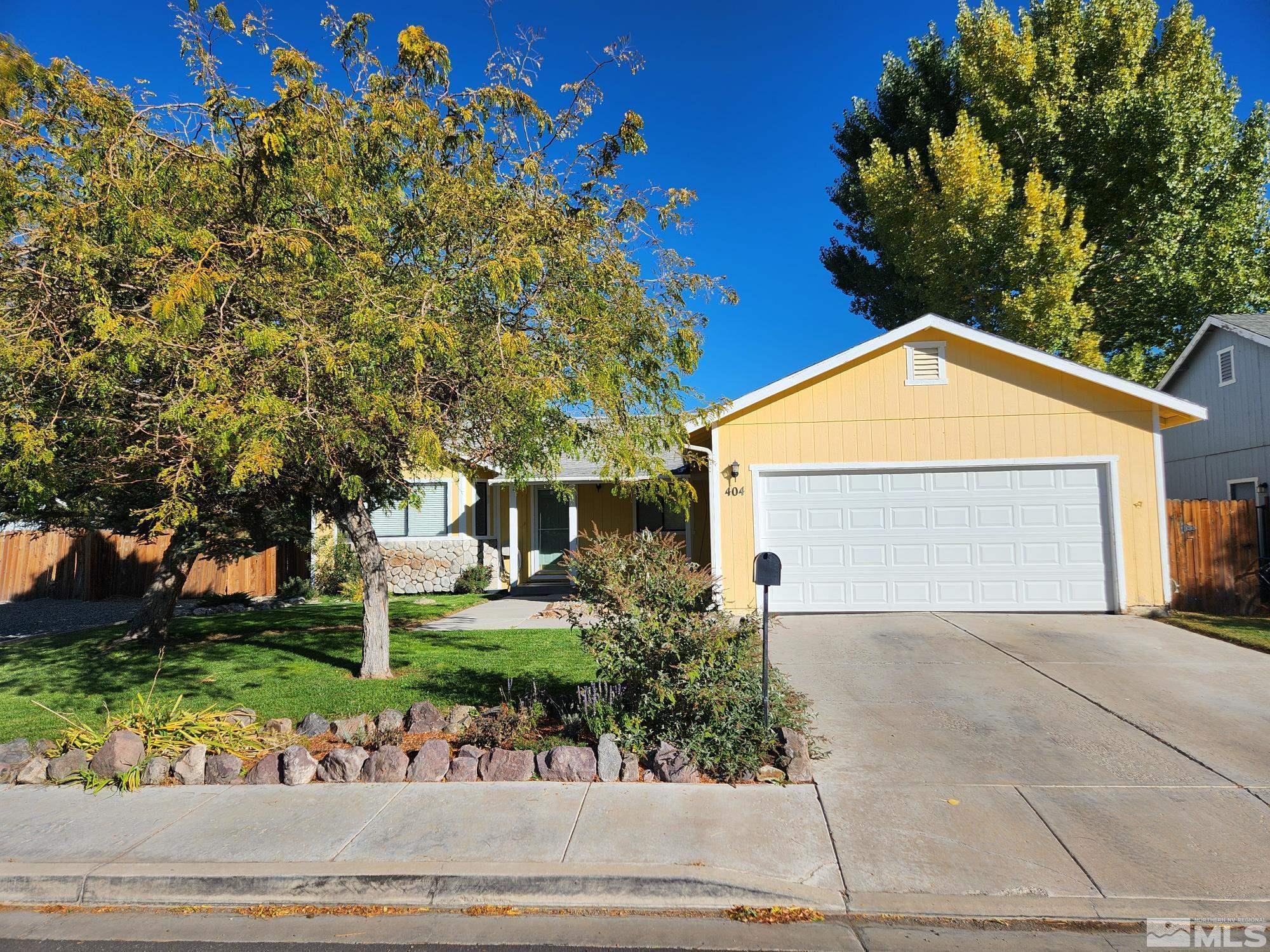 front view of a house with a street