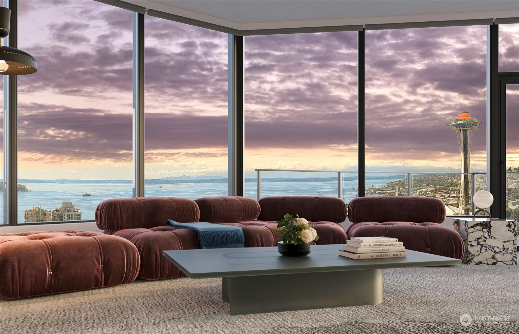 a living room with furniture and floor to ceiling windows