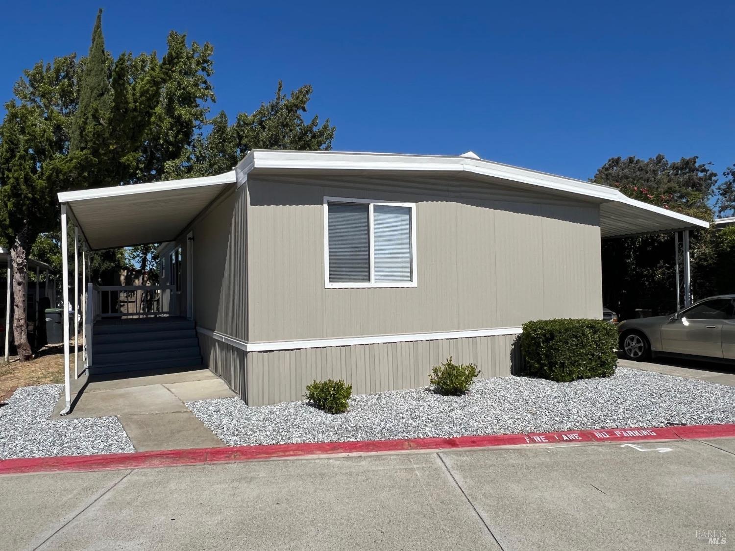 a front view of a house with garage