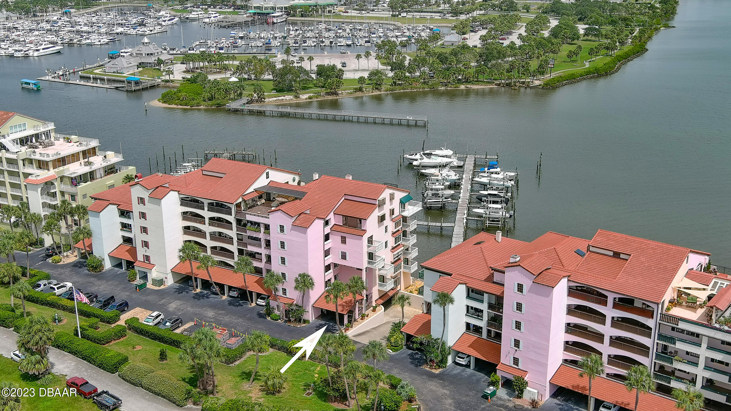 an aerial view of a house with a lake view