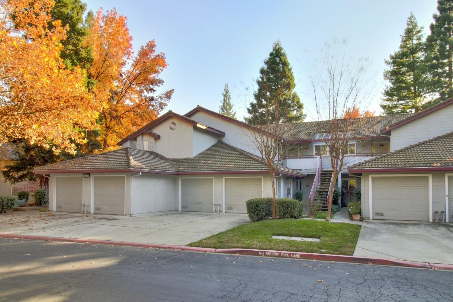 front view of a house next to a yard