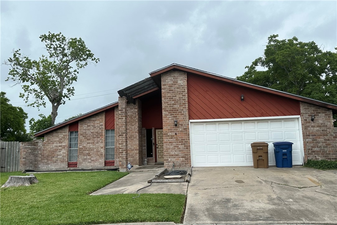 a front view of house with yard