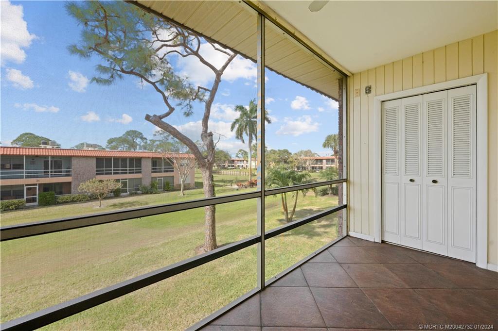 a view of a large window with an outdoor space