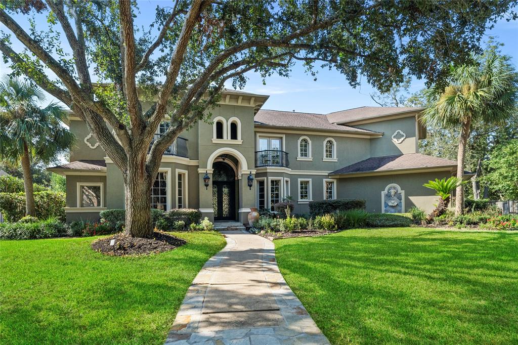 Exquisite Mediterranean LUXURY HOME located in sought-after SWEETWATER golf-course community.