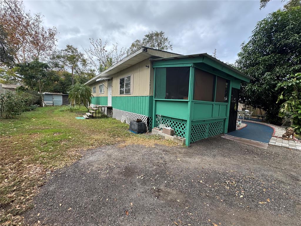 a view of a house with a yard