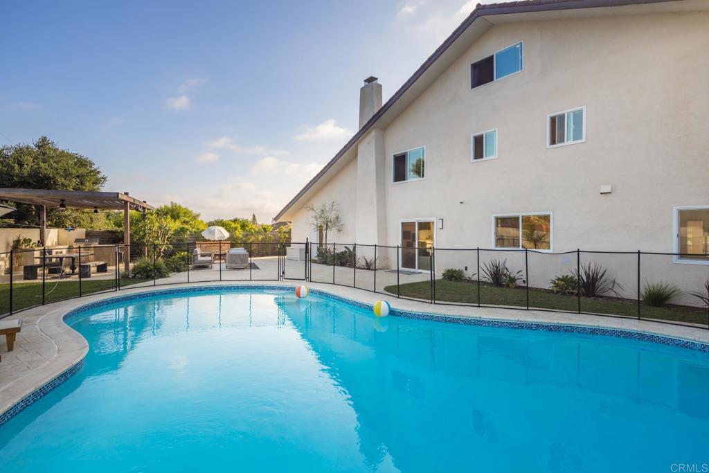 a view of a house with swimming pool